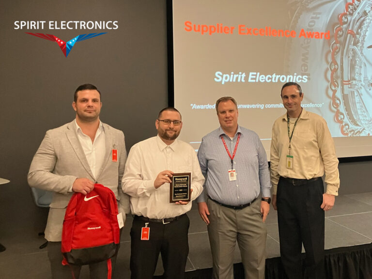 Daniel Rowan and Travis Ireland accept the Supplier Excellence Award at the Honeywell Space Supplier Summit 2024